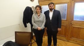 Sorcha Edwards with the Director of the Parliamentary Group of the governing party, SYRIZA, Kostas Zachariadis